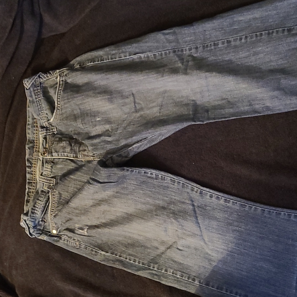 Bundle of 3 jeans and 1 pair of khakis men's size 32.